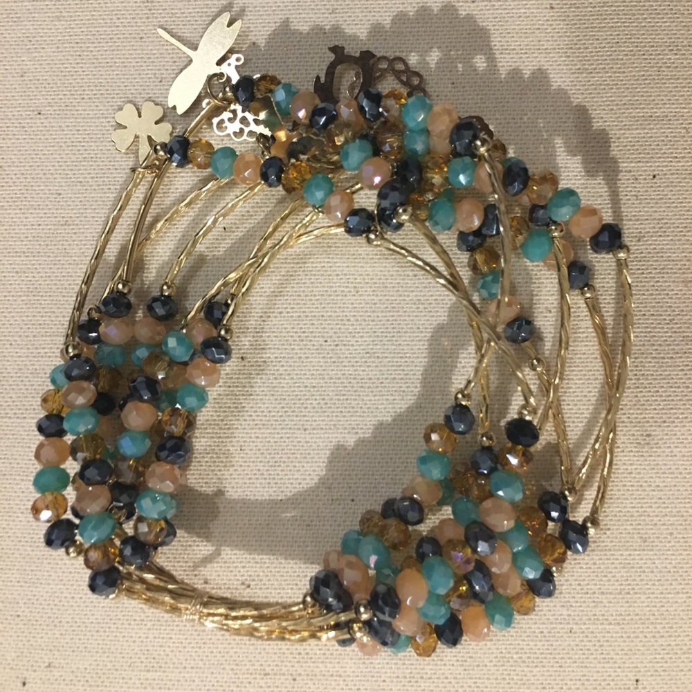 7 bracelets with charms